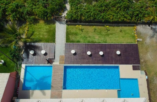 Aritagua Apartamento | R.11 - Condomínio Praia da Pérola - Rodovia Ilhéus x Itacaré BA