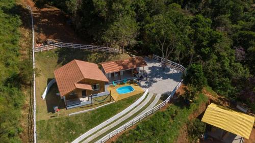 Alto Caparao Casa | Recanto Águas Nascentes - Casa na serra com piscina e cachoeira no quintal!