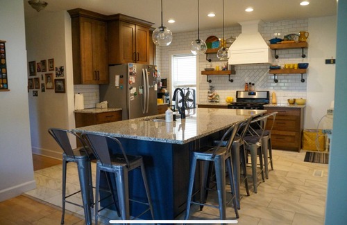 Ogden Casa | Recently Renovated Brick Bungalow in Historic Neighborhood.