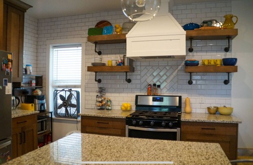 Ogden Casa | Recently Renovated Brick Bungalow in Historic Neighborhood.
