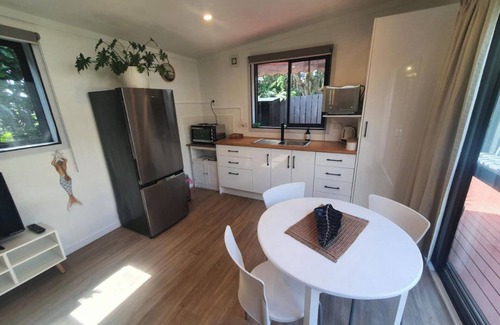 Red Beach Cabaña | Red Beach Garden Cottage: Where cozy meets convenience!