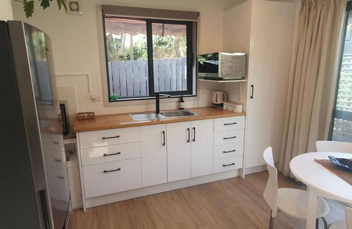 Red Beach Cabaña | Red Beach Garden Cottage: Where cozy meets convenience!