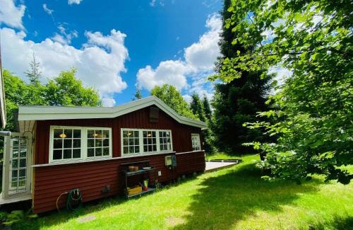 Ramlose Casa | Red Wood House Within Frederiksværk's Nature