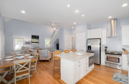 Cape Fear Station Casa | Reel Life tucked into a pretty, wooded bend in prestigious Cape Fear Station!