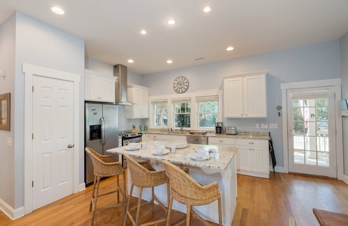 Cape Fear Station Casa | Reel Life tucked into a pretty, wooded bend in prestigious Cape Fear Station!