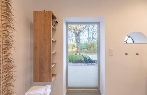 Tetenbull Casa | reetgedecktes Ferienhaus mit Kachelofen