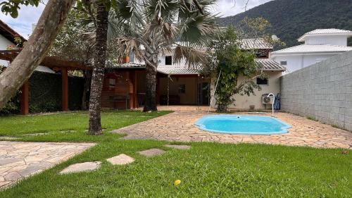 Centro Casa | Refúgio a poucos passos da Praia de Guaecá