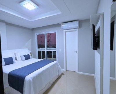 Guarapari Apartamento | RefugioBacutia- Prédio FRENTE MAR Bacutia- 6 pessoas- 3 Quartos com AR sendo 1 suite - varanda- sala de estar e jantar Ampla -Piscina e Sauna no Prédio