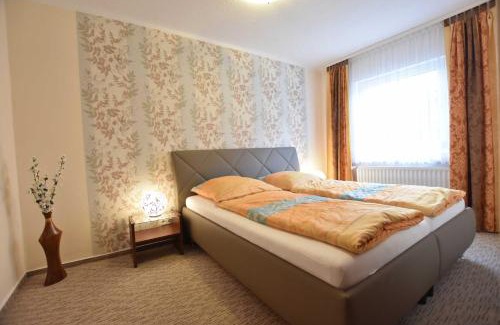 Satow Apartamento | Reihenferienhaus mit Kamin und Terrasse im Ostseeland OFC 11