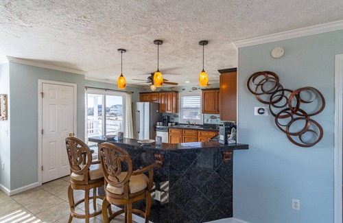 Corolla Casa | Relax among the dunes and see wild horses from the porch at Shifting Sands!