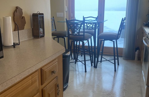 Lake Casa | Relax at the outdoor firepit or hot tub overlooking all-sports Eight Point Lake!