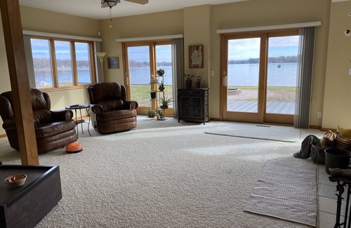 Lake Casa | Relax at the outdoor firepit or hot tub overlooking all-sports Eight Point Lake!