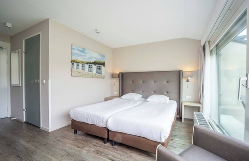 Westkapelle Hotel | Relax by the Sea: Terrace with Dune View, Pool, Beach Access & Onsite Dining