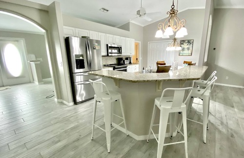 Burnt Store Casa | Relax!! Canal Home, Sunsets, Heated Pool, Lanai with TV, Boat Dock, Gulf Access