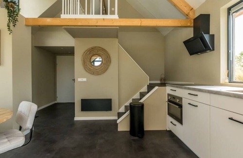 Westenschouwen Casa | Relax in this chalet, experience the spaciousness from the sofa, from the ridge beam to the surround