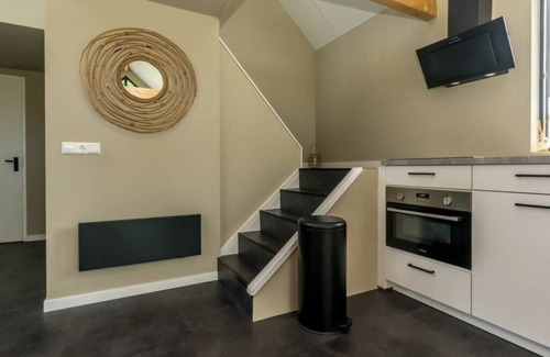 Westenschouwen Casa | Relax in this chalet, experience the spaciousness from the sofa, from the ridge beam to the surround