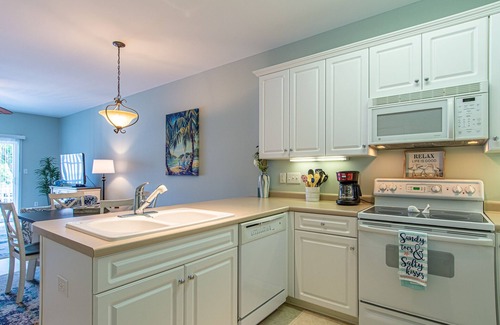 Southport Condominio | Relax & Unwind in Blue Haven!