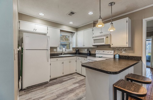 Ocean Isle Beach Casa | Sun, Sand & S’mores – Dog-Friendly OIB Stay