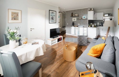 Norderney Apartamento | "Relax with a sea view: Above the rooftops of Norderney"