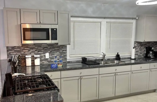 Orange Casa | Relax with your family in this newly renovated home away from home.
