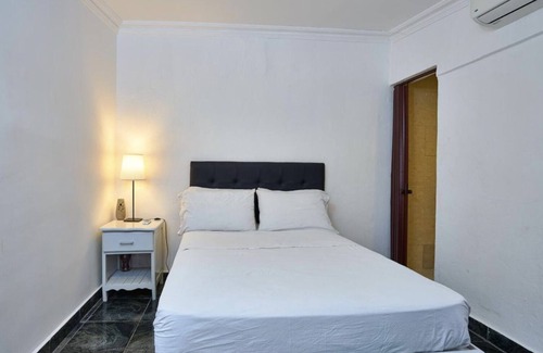 Zona Colonial Hotel | Habitación histórica estándar en la zona colonial.