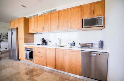 Playa Mujeres Apartamento | Beachfront Bliss, Rooftop Jacuzzi, Private Pools