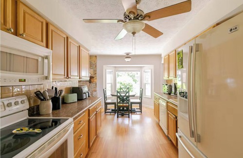 Long Bay Estates Casa | Relaxing Mediterranean style home w/hot tub, 2 golf carts, private beach access