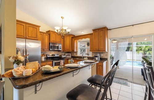 Pelican Casa | Relaxing outdoor with pool and hot tub!