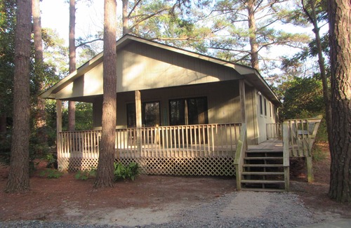 Manteo Casa | Remodeled cottage with plenty of outdoor space and privacy