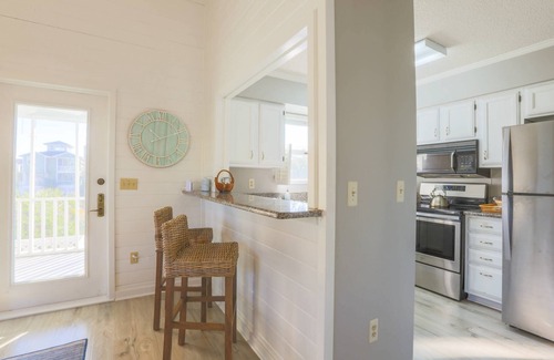 Pelican Bay Casa | Renovated Home w/ Lagoon Views, Screened Porch, Deck & Community Pool; 5 Minute Walk to Beach!