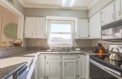 Pelican Bay Casa | Renovated Home w/ Lagoon Views, Screened Porch, Deck & Community Pool; 5 Minute Walk to Beach!