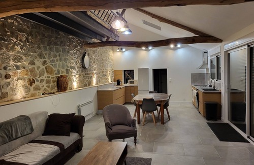 Nexon Casa | Renovated old house with large living room.