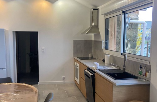 Nexon Casa | Renovated old house with large living room.