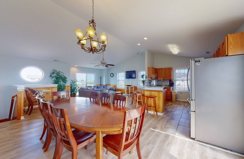 Wind Over Waves Casa | Renovated water-view house with private pool, hot tub, game room, & central AC