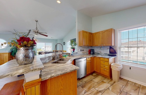 Wind Over Waves Casa | Renovated water-view house with private pool, hot tub, game room, & central AC