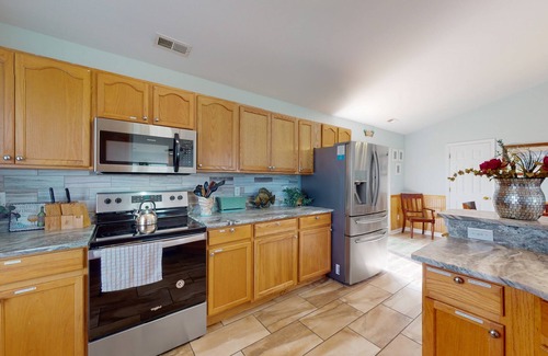 Wind Over Waves Casa | Renovated water-view house with private pool, hot tub, game room, & central AC