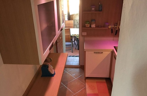 Baja Sardinia Casa | ESCALA DE RESIDENCIA CERRADA