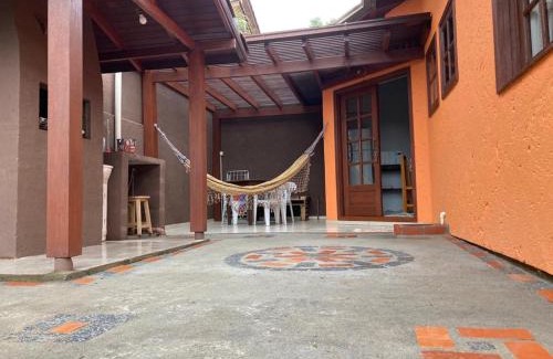 Garopaba Casa | Residencial Casa Laranja - Casas na Praia da Ferrugem