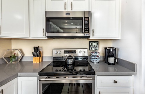 Phoenix Casa | Resort Style Backyard- Heated Pool, Putting Green, Outdoor TV and Pool Table.