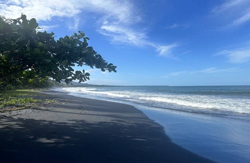 Cahuita Casa | Rest , Restore, and Relax steps away from the beautiful black sands beach.