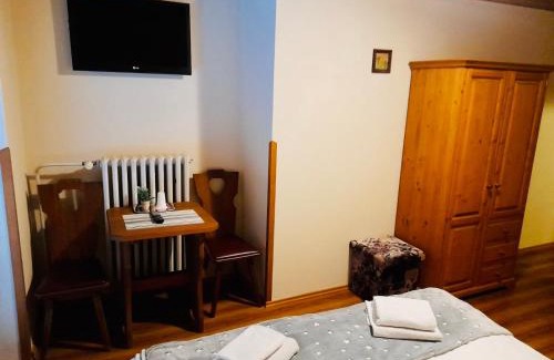 Karlstejn Casa | Restaurant a penzion Pod Draci skalou