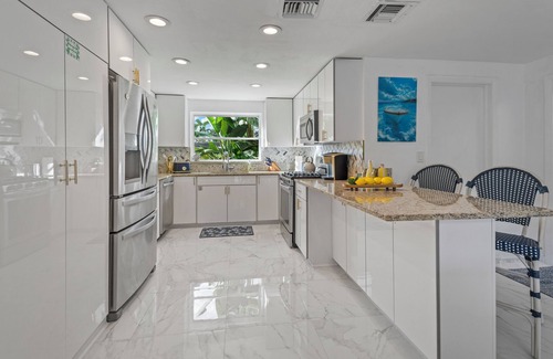 Riverside Park Casa | Retreat@Sailboat Bend Heated Pool BBQ - 100ft Dock 10 min to Ft Lauderdale Beach