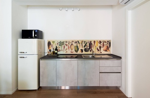 Mestre Apartamento | Retírese a este apartamento acogedor, moderno y glamoroso