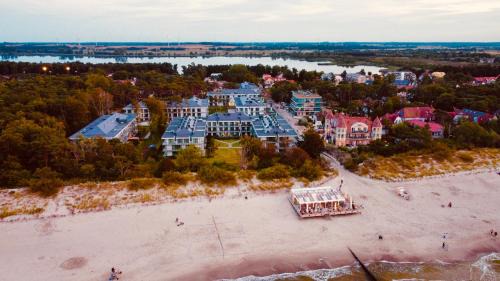 Niechorze Apartamento | REZYDENCJA NIECHORZE Apart 123 ogrodzony ogródek przy plaży