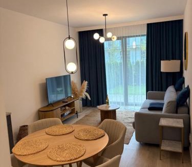 Niechorze Apartamento | REZYDENCJA NIECHORZE Apart 123 ogrodzony ogródek przy plaży