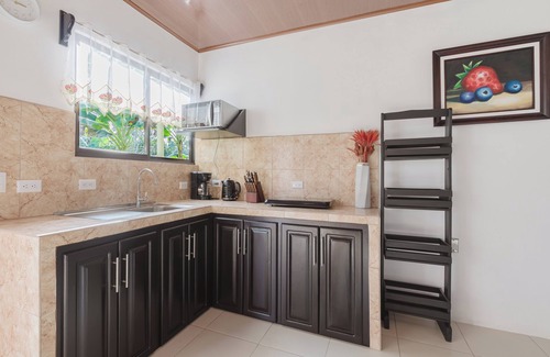 Northern Plains Apartamento | Rio Celeste Birds Garden apartment with A/C perfect for Family and couples