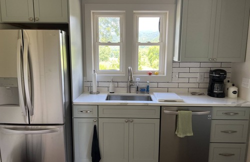 Andrews Otro | River Stone Farmhouse on 35 acres with trout stream