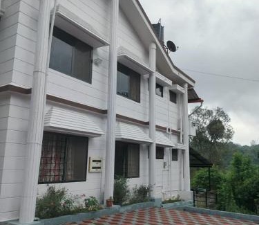 Madikeri Casa | River view white villa