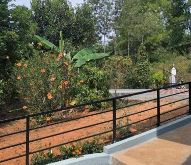 Madikeri Casa | River view white villa