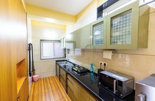 Tonse West Apartamento | Riverside Retreat HomeStay – AC Studio with Breakfast Option & Boat Ride